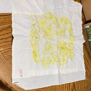 White Fabric with Yellow Embroidery